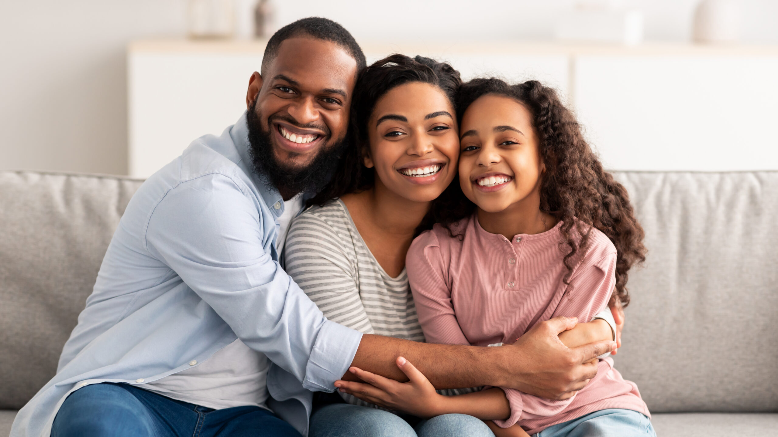 family that schedules dental checkups with their riverside dentist